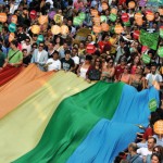 Turkish homosexuals and human rights activists chant slogans as they hold a giant rainbow flag during the Gay Pride Parade march on Istiklal Avenue in Istanbul, on June 27, 2010. Photo credit MUSTAFA OZER/AFP/Getty Images