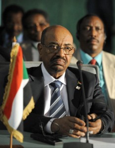 Sudan's President Omar al-Bashir takes part in the African Union Summit on health focusing on HIV/AIDS, TB and malaria. Nigeria's president defended welcoming Sudan President Omar al-Bashir to the African Union health summit despite war crimes charges against him, saying it could not interfere in AU affairs.     (Photo Credit: Pius Utomi Ekpei/AFP/Getty Images).