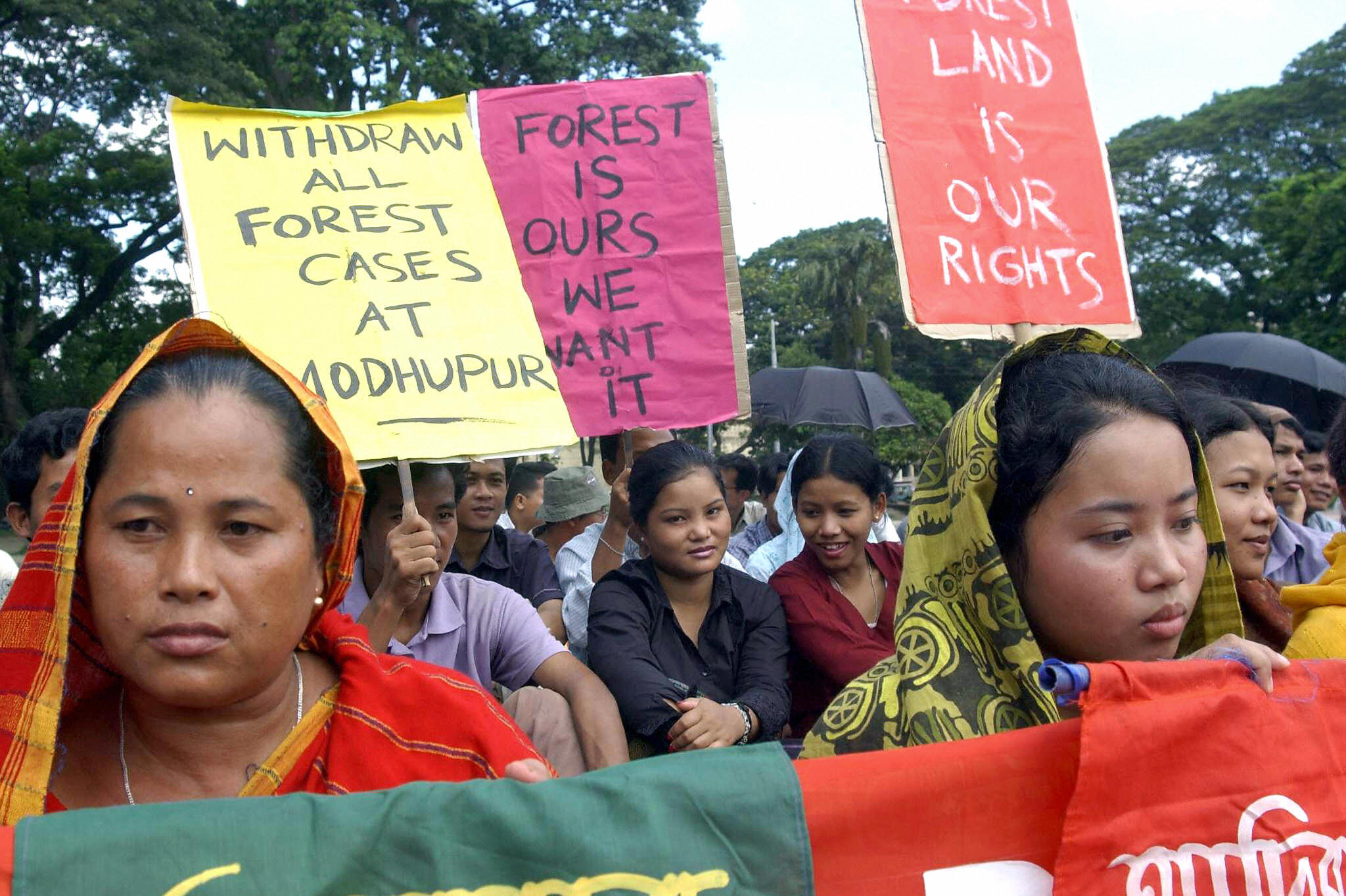 Indigenous Bangladeshi women during a demonstration demanding an end to encroaching development on their lands, still asking for the rights Kalpana Chakma fought for before her disappearance (Photo Credit: Shawkat Khan/AFP/Getty Images).