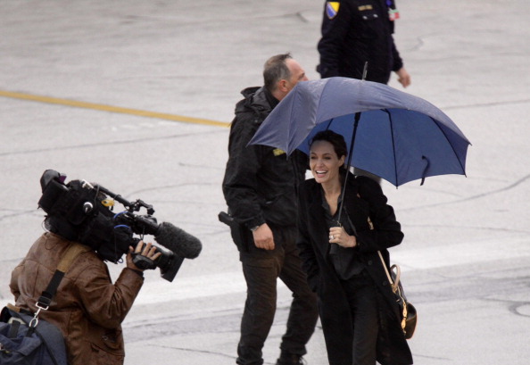 UNHCR Special Envoy Angelina Jolie arriving at the airport in Sarajevo to visit Bosnia ahead of the Global Summit to End Sexual Violence in Conflict in Bosnia and Herzegovina on March 27, 2014 (Photo Credit: Samir Yordamovic/Anadolu Agency/Getty Images).