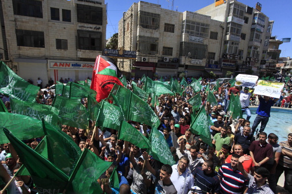Palestinians in Ramallah gather to protest Israeli attacks on Gaza on July 25,2014 as fatalities continue to rise everyday. 