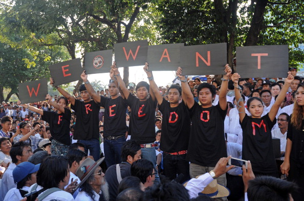 A group of protesters call for the abolition of repressive laws and an end to politically related arrests in Yangon on January 5, 2013. Thousands joined a rally in Myanmar's main city to call for the abolition of repressive laws and an end to politically related arrests. (Photo Credit: Soe Than WIN/AFP/Getty Images)