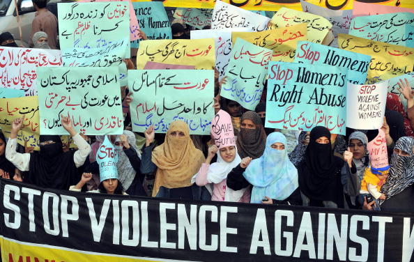 Supporters of Tehrik-e-Minhaj ul Quran, an Islamic organisation, protest against 'honor' killings of women in Lahore (Photo Credit: Arif Ali/AFP/Getty Images).