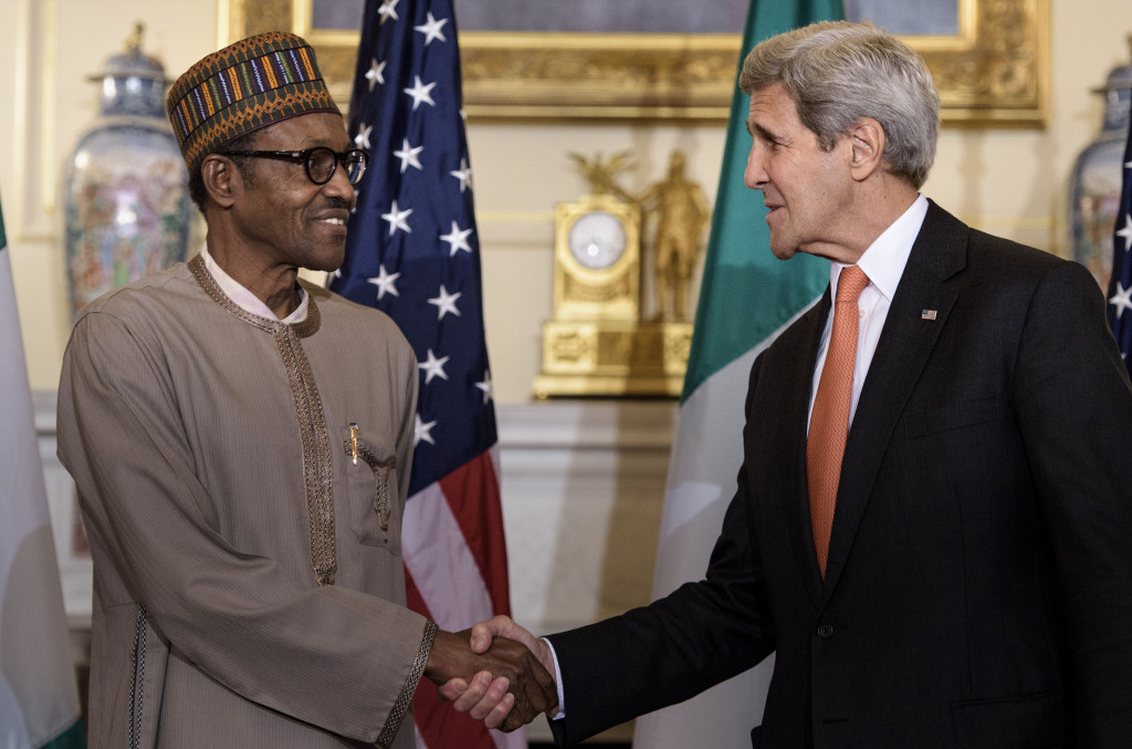 US Secretary of State John Kerry shakes hands with Nigerian President Muhammadu Buhari at the US Department of State July 21, 2015 in Washington, DC. (BRENDAN SMIALOWSKI/AFP/Getty Images)