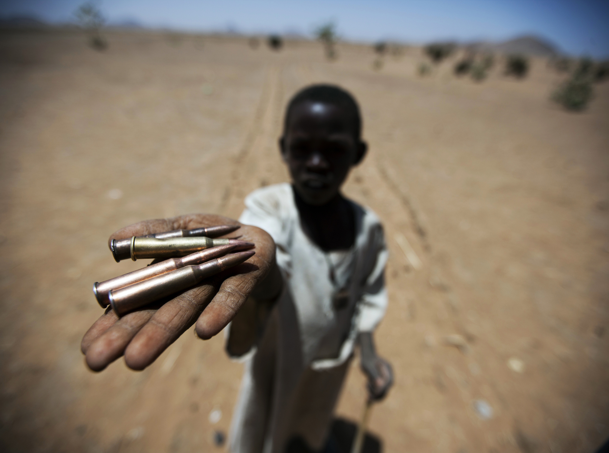 Sudan | Child holds bullets