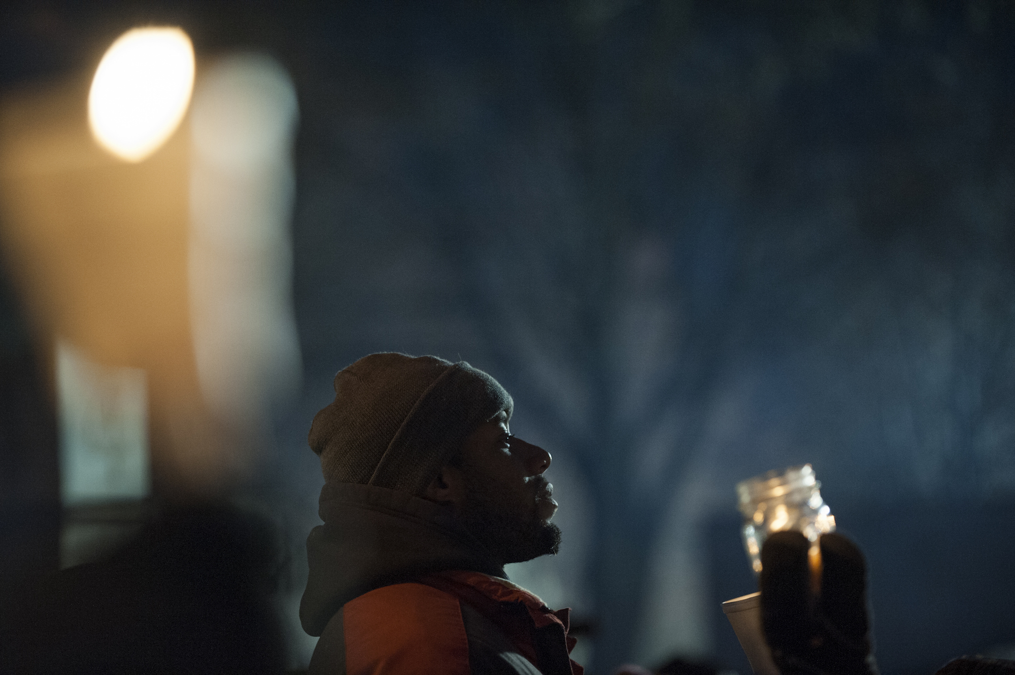 Protestors, activists, and community members listen to speeches at a candlelight vigil held for Jamar Clark on November 20 in Minneapolis, Minnesota. (Stephen Maturen/Getty Images)