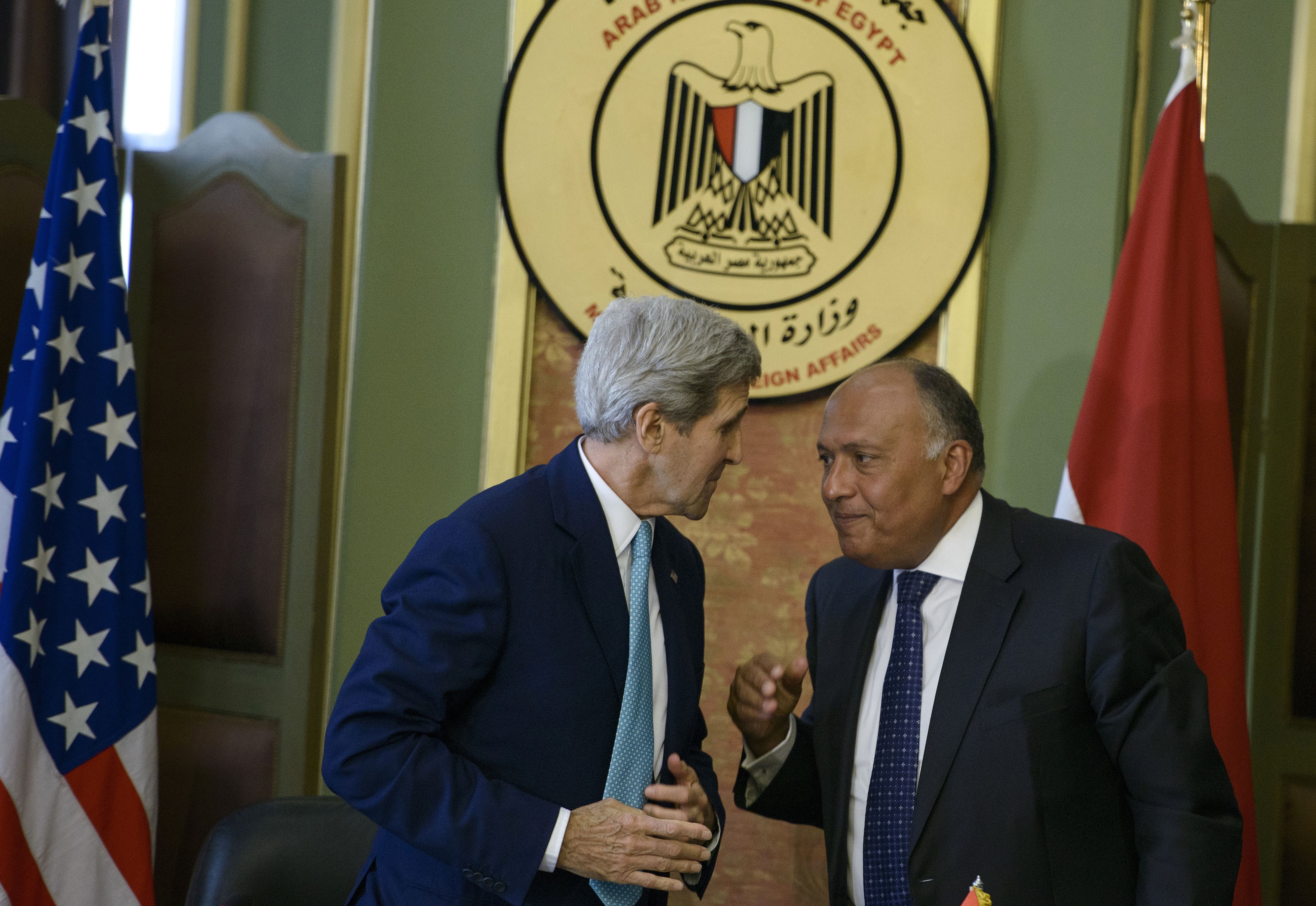 US Secretary of State John Kerry (L) and Egypt's Foreign Minister Sameh Shoukry. BRENDAN SMIALOWSKI/AFP/Getty Images)