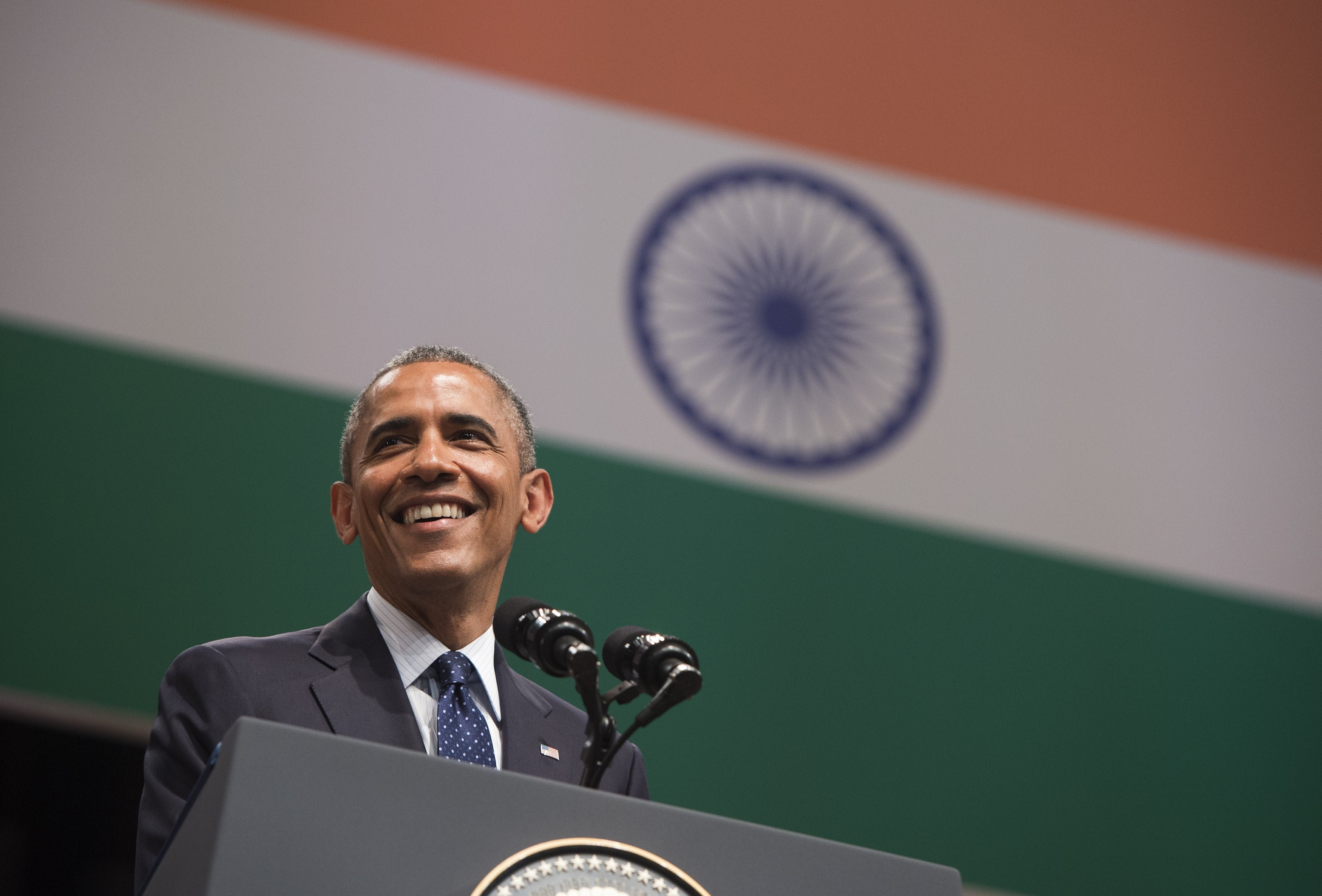 US President Barack Obama speaks on US - India relations during a townhall event at Siri Fort Auditorium in New Delhi on January 27, 2015. US President Barack Obama warned January 27 that the world does not "stand a chance against climate change" unless developing countries such as India reduce their dependence on fossil fuels. AFP PHOTO / SAUL LOEB        (Photo credit should read SAUL LOEB/AFP/Getty Images)